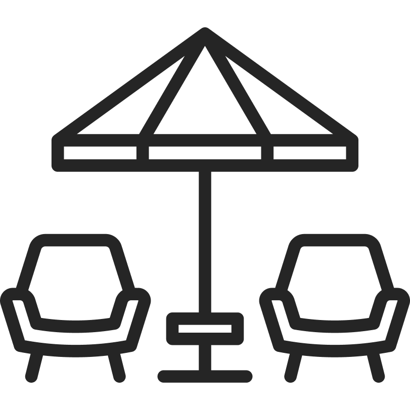 Icon représentant deux fauteuil et un parasol.