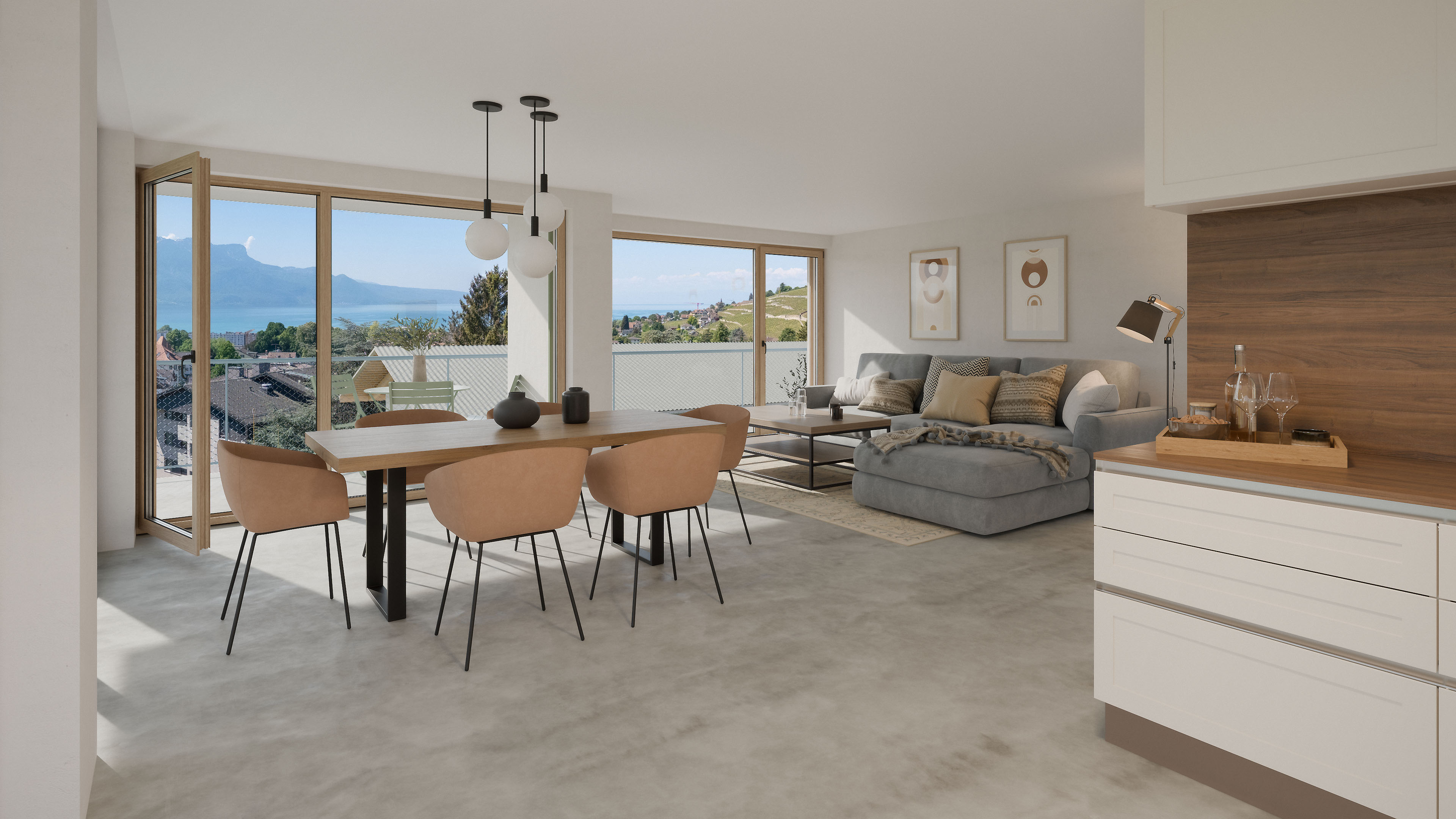 Salon moderne avec canapé gris, table à manger en bois, chaises et grande baie vitrée donnant sur paysage.