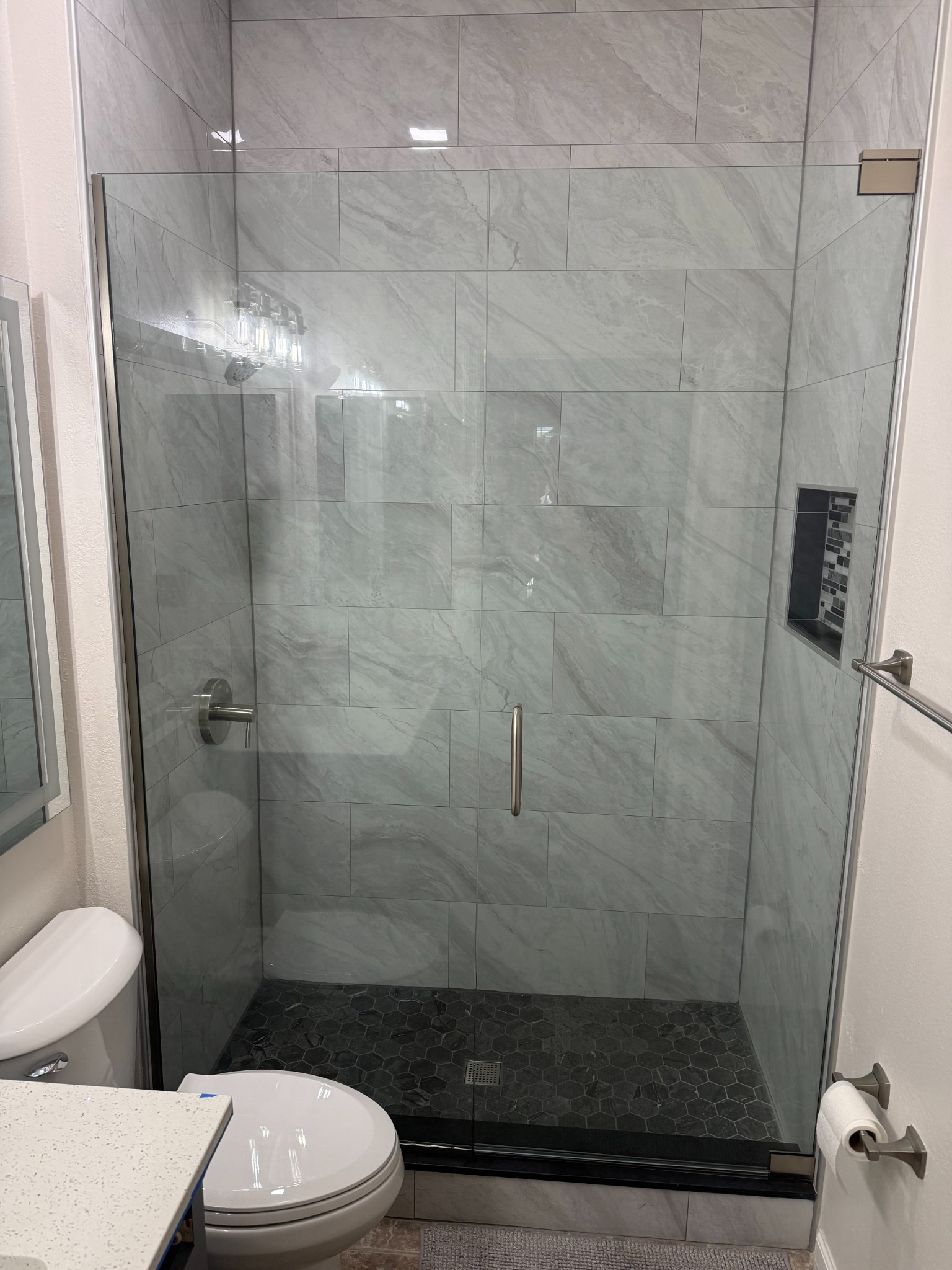 Custom frameless shower glass enclosure in Tampa Bay