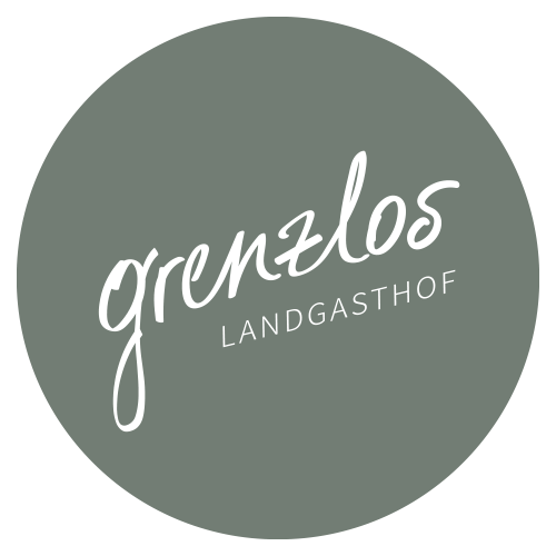 Logo mit dem Schriftzug grenzlos Landgasthof in weiß auf grünem runden Hintergrund