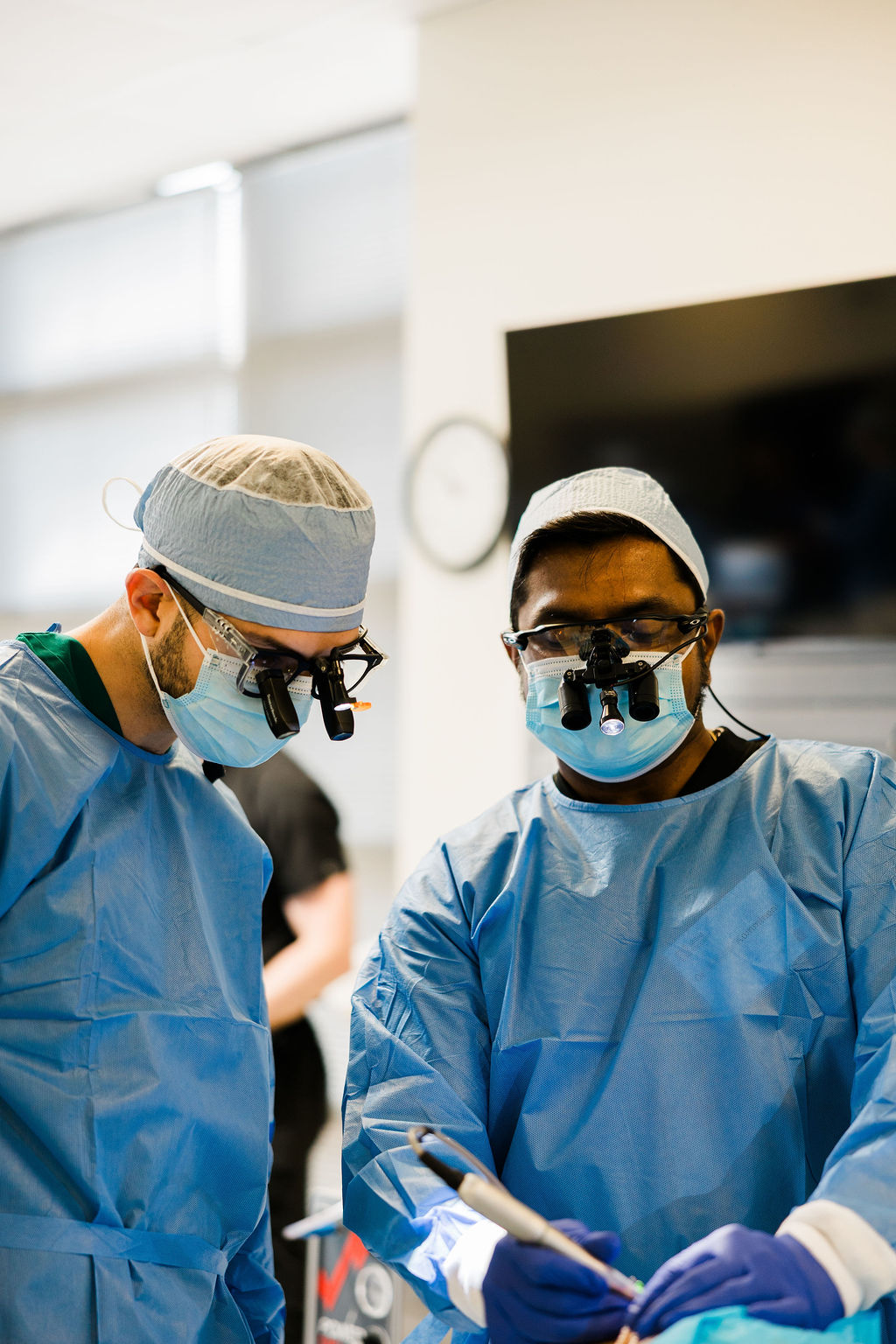 Two oral surgeons