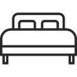 Simple black and white line icon of a double bed with two pillows.