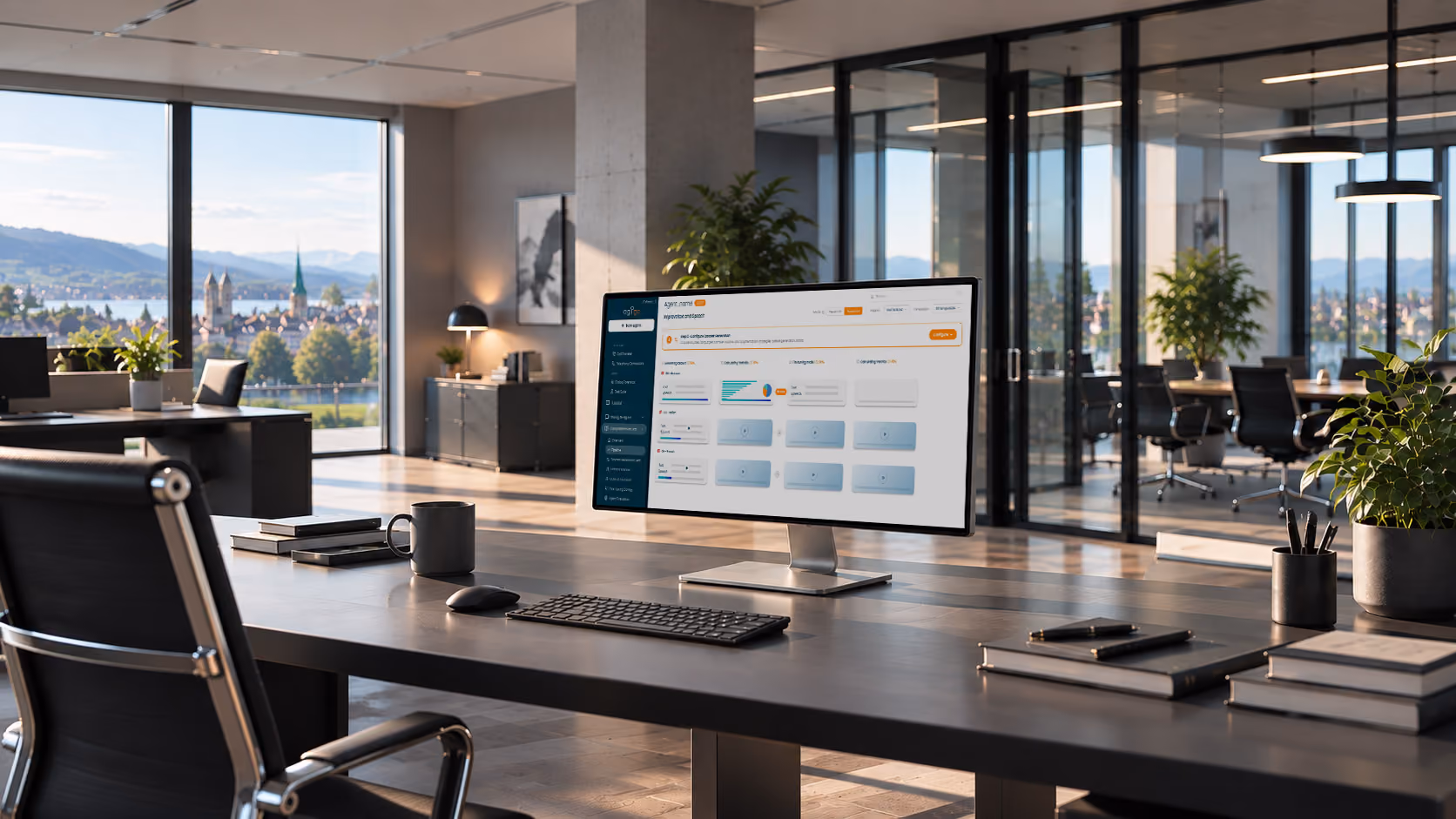 Modern office workspace with a large monitor displaying a dashboard, a keyboard, mouse, books, a coffee mug, and plants on the desk, with large windows showing a scenic city and mountain view in the background.