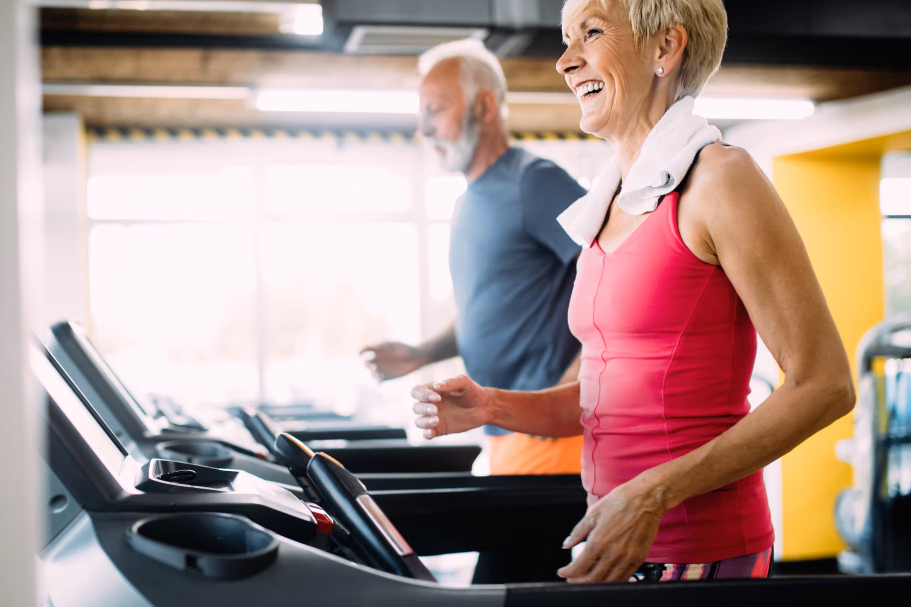 Seniors on treadmill stock image
