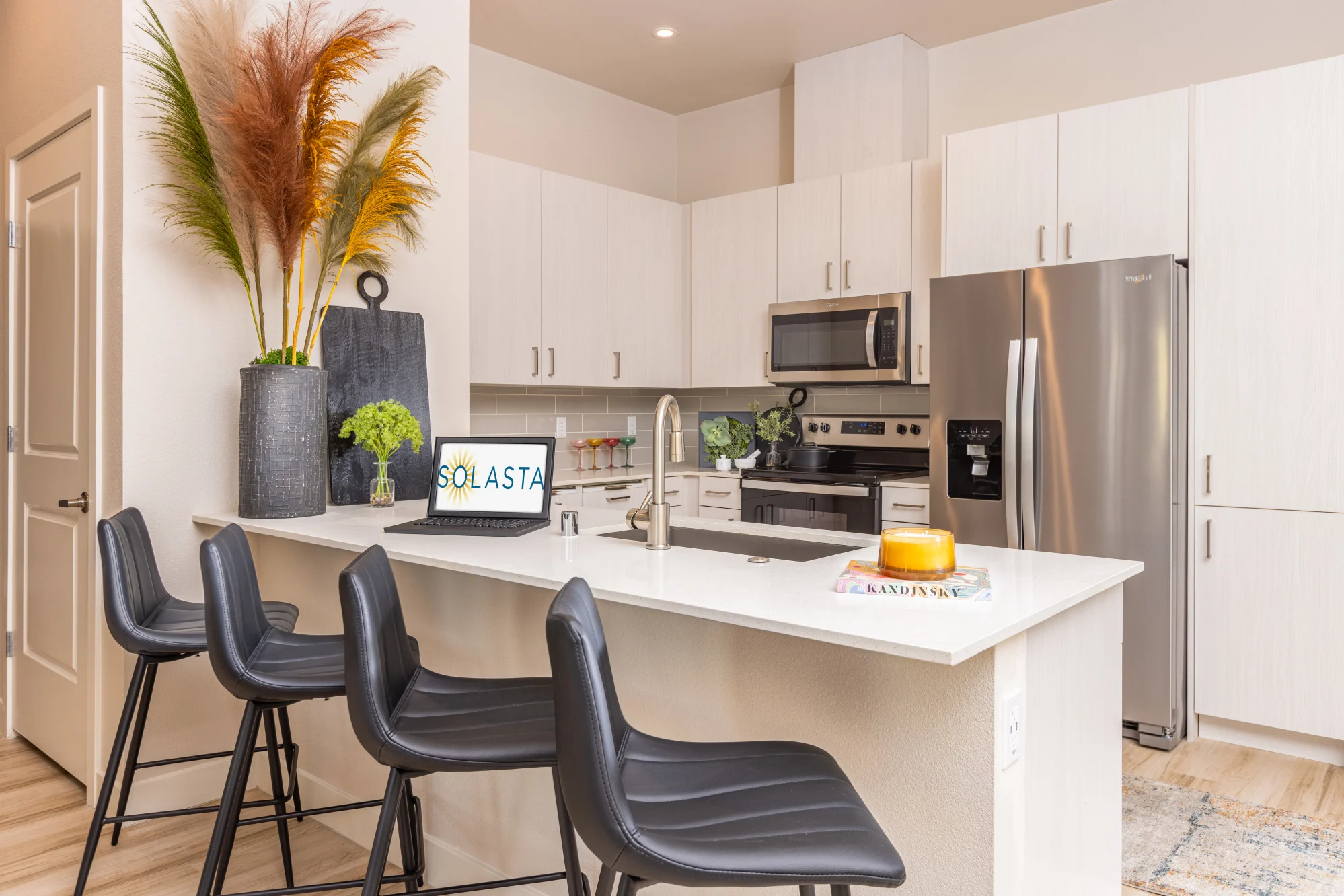 Kitchen island with barstools