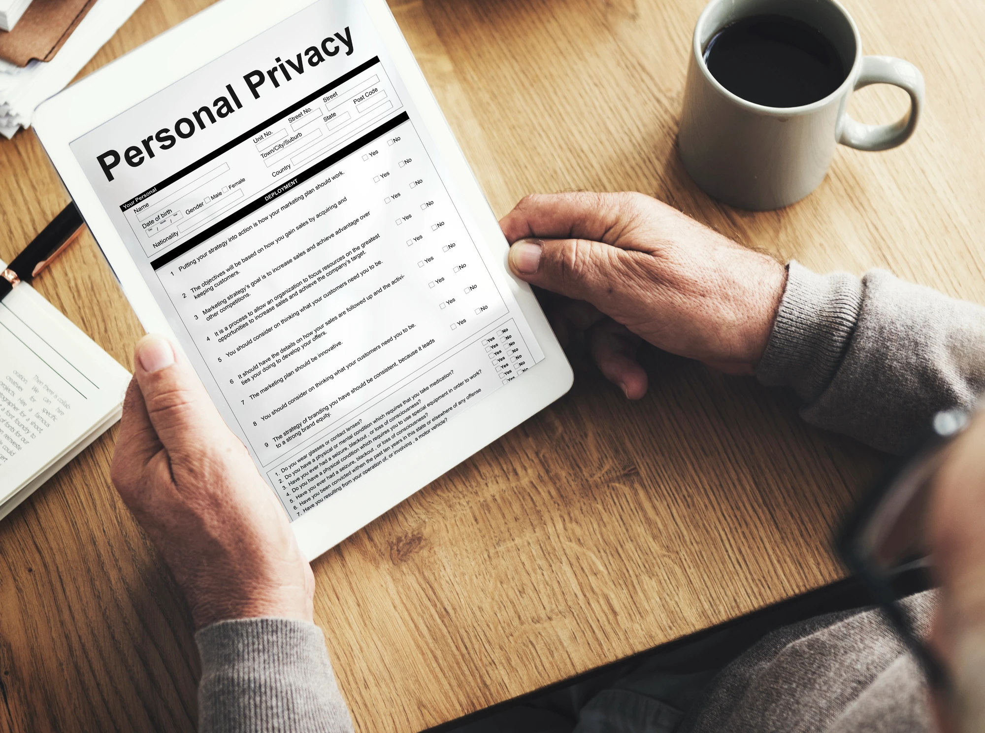 person holding privacy policy document