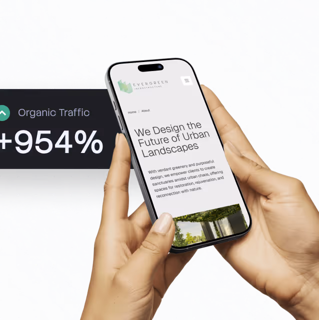 Hands holding phone showing Evergreen's urban landscape design webpage with 954% organic traffic growth.