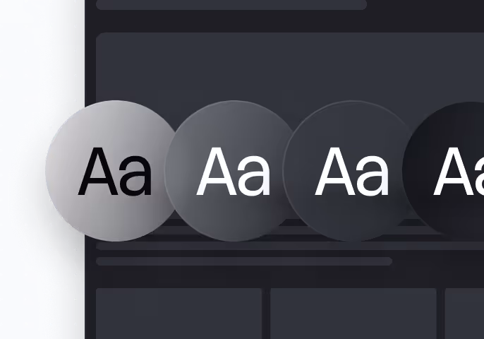 Row of four circular buttons showing Aa text in different shades of gray and black background.