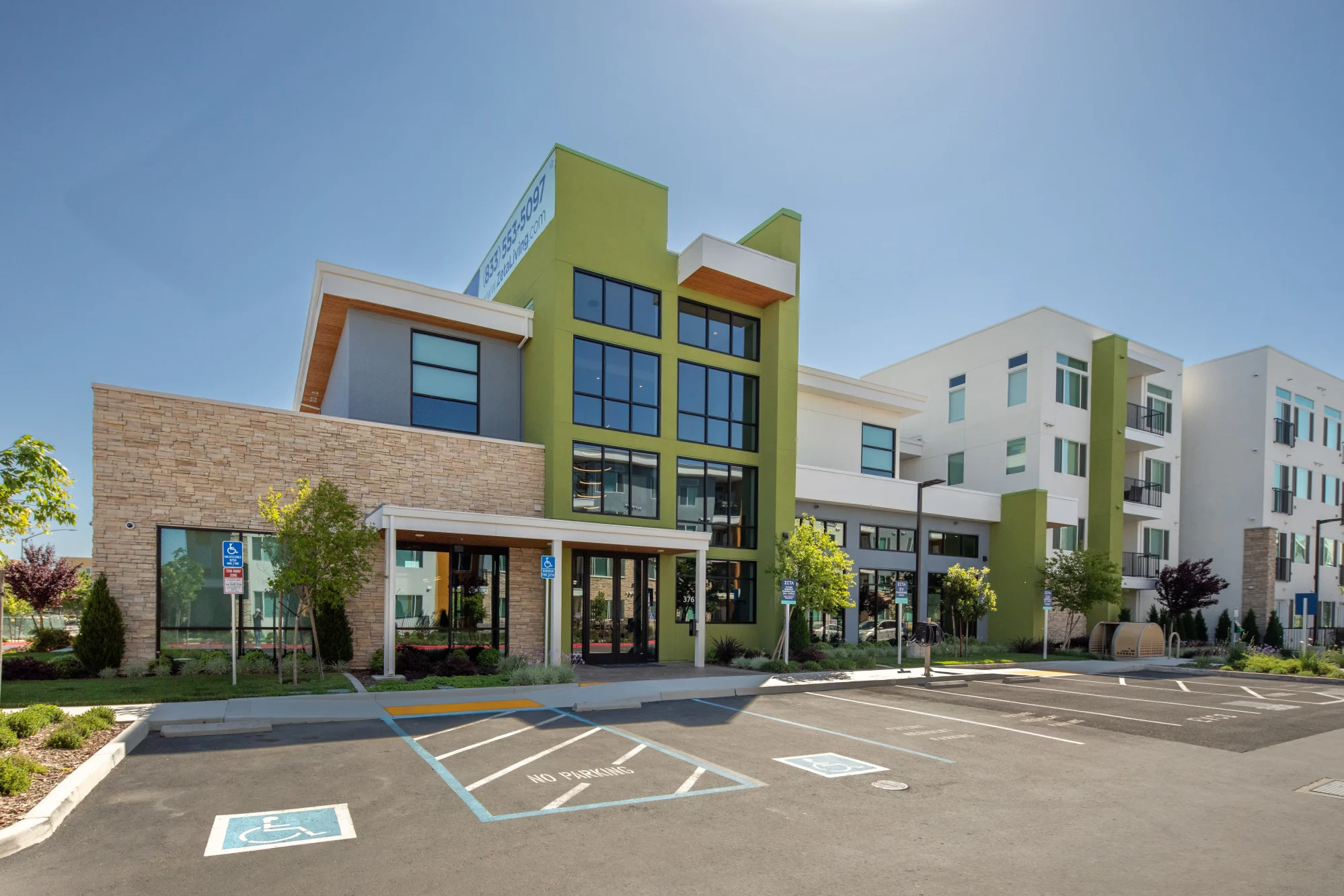 Exterior of community building and parking lot