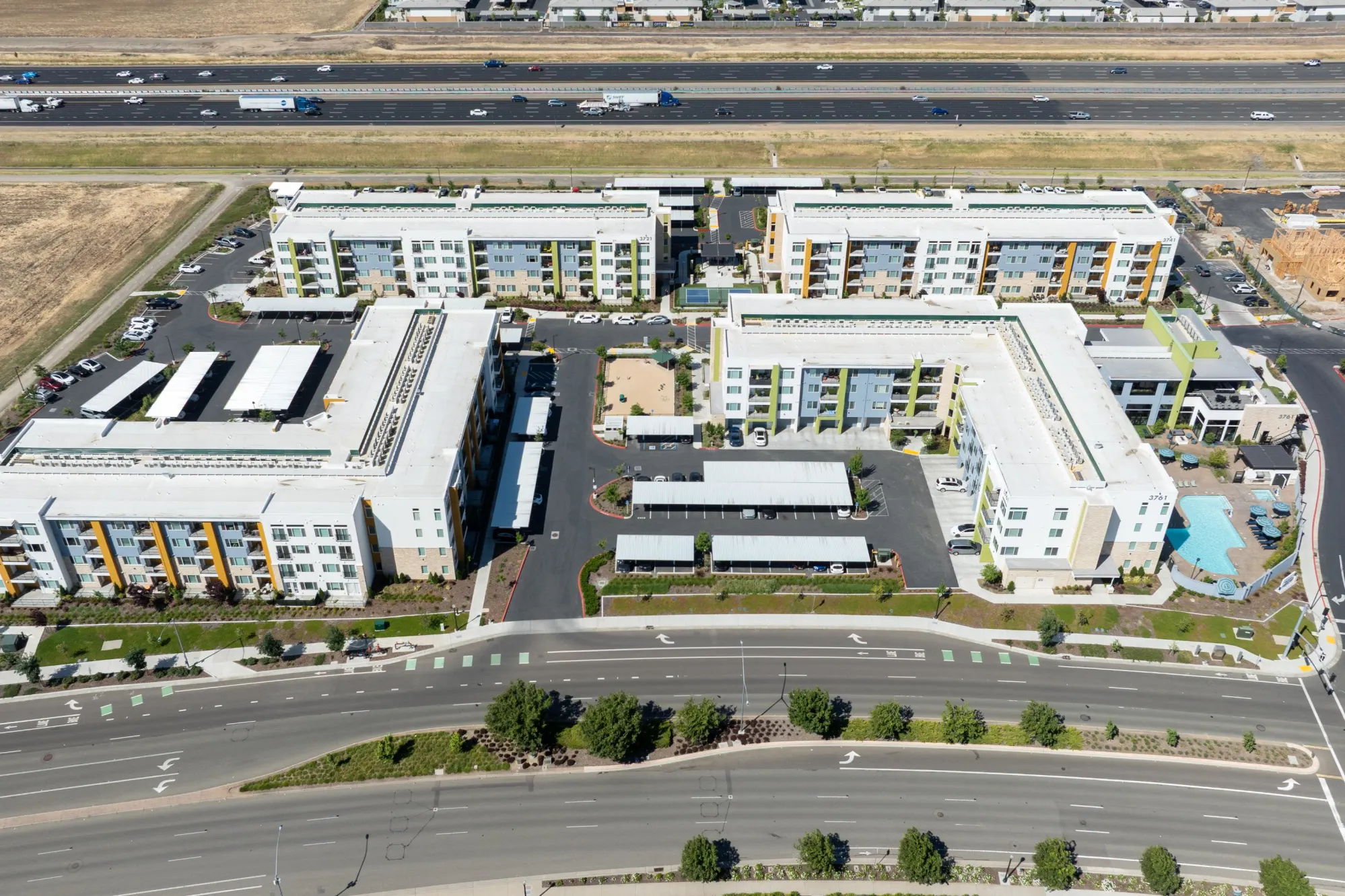 Exterior of community building and parking lot