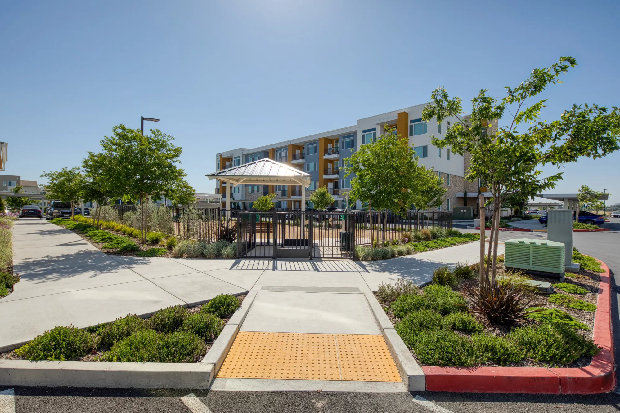 Exterior of community building and parking lot