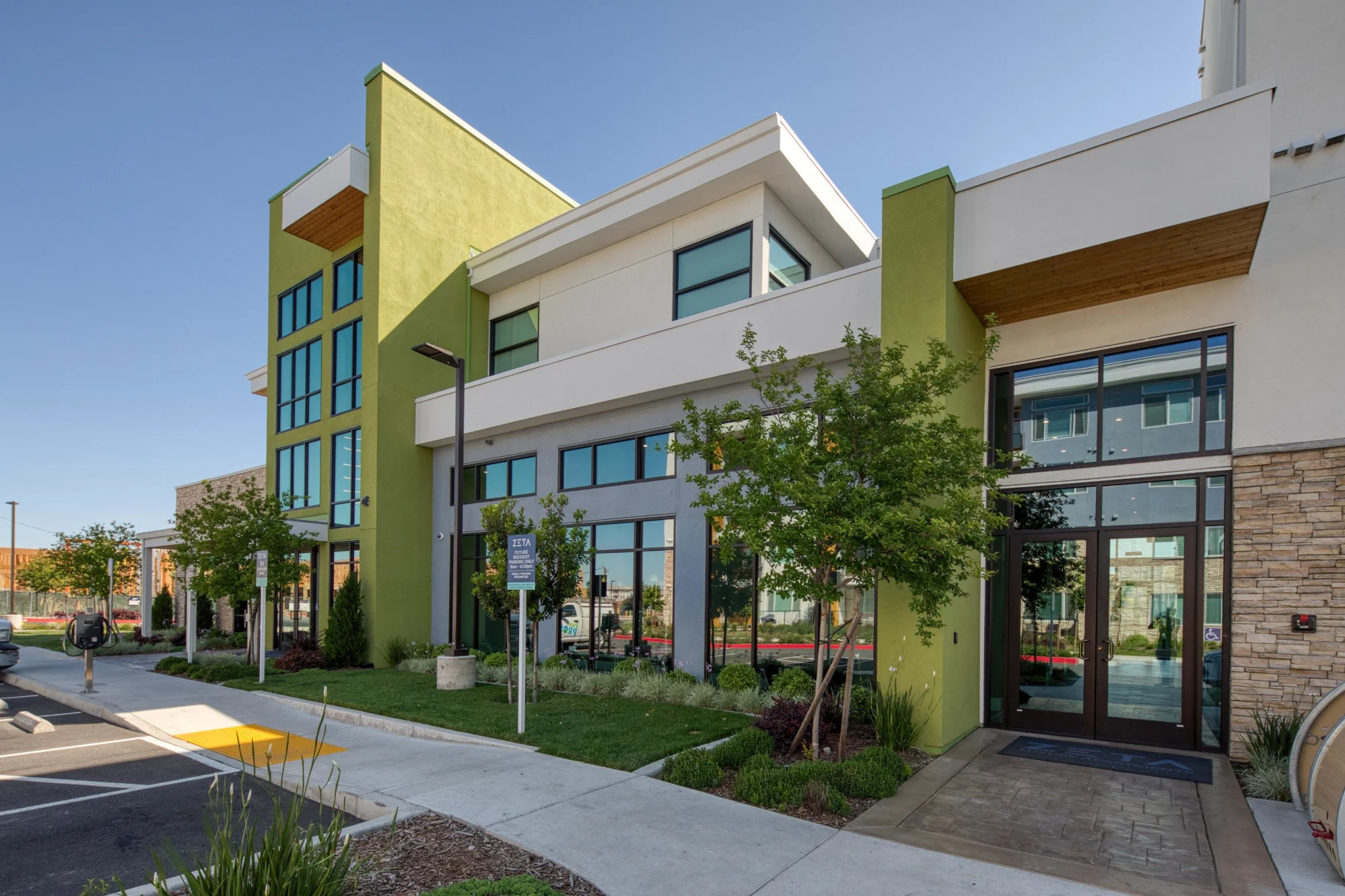 Exterior of community building and parking lot