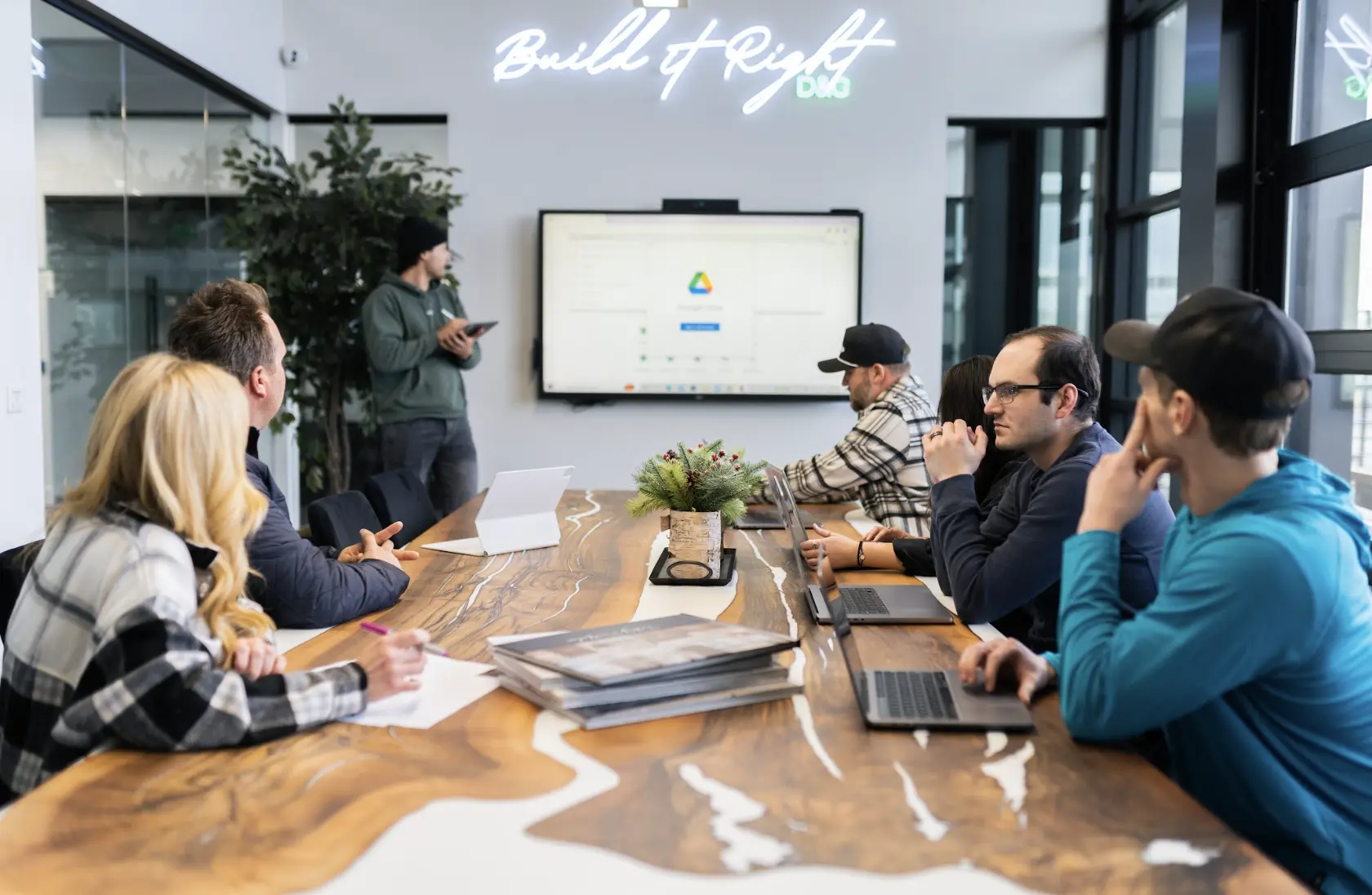 Marketing team sitting at a conference table