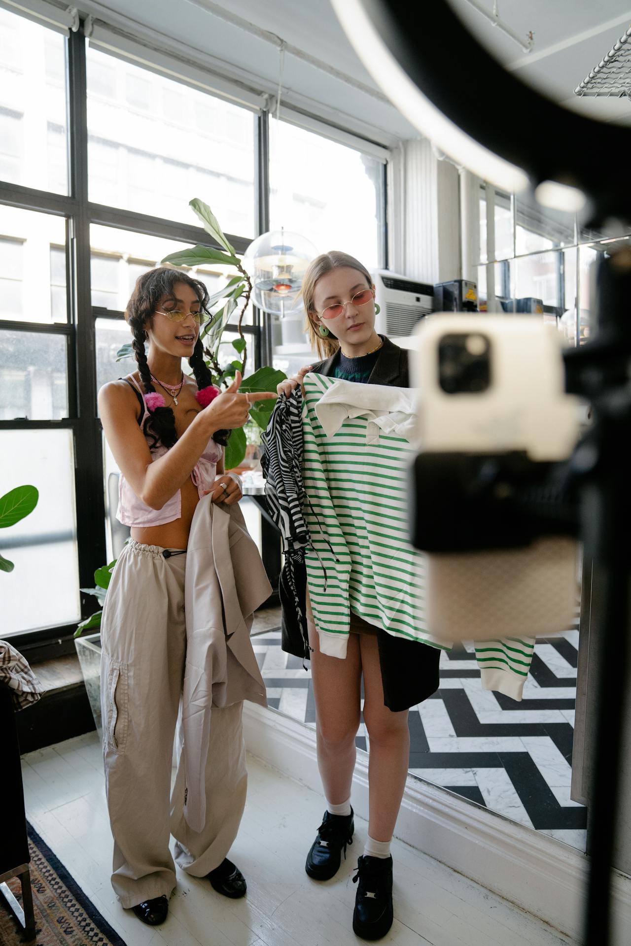 UGC creators aking content for a boutique