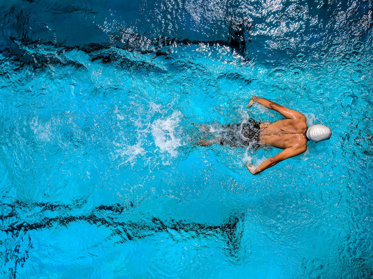 A swimmer competing in the pool