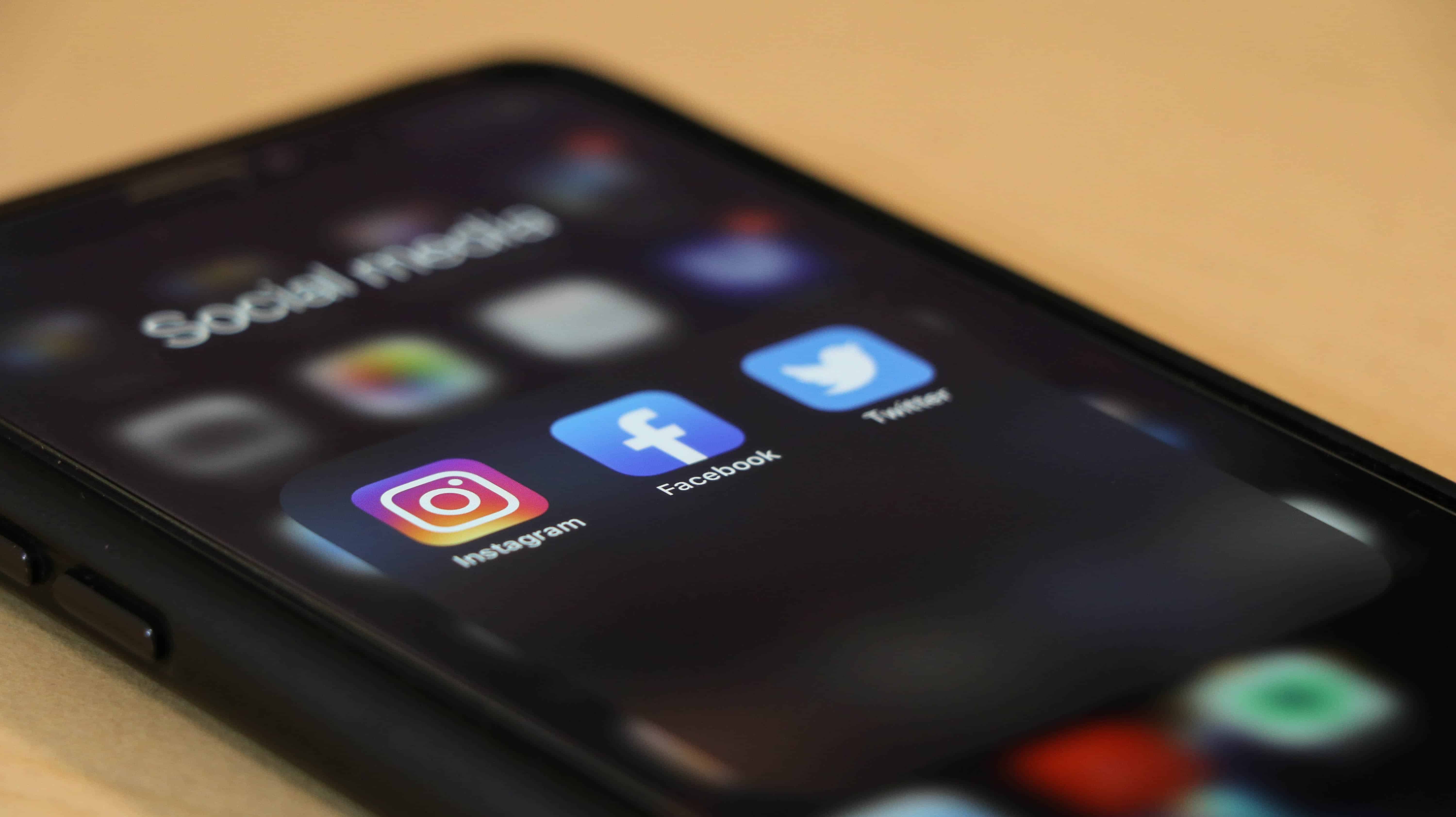 Phone showing social media icons