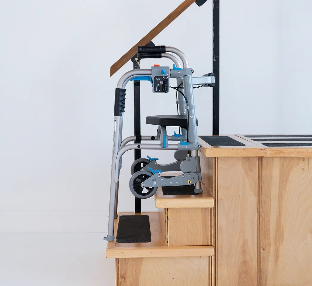 The StairAssist Walker positioned on a staircase in stair mode