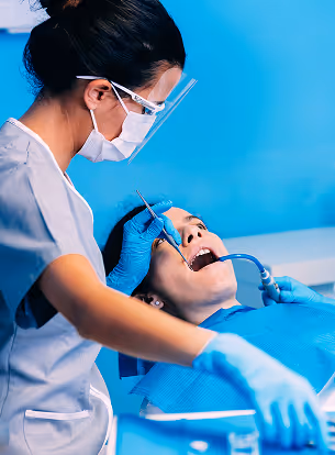 female-dentists-examining-woman-clinic 1