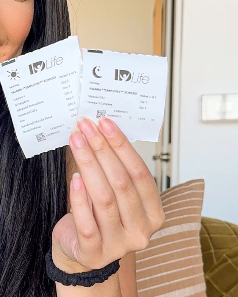A customer's two IDNutrition packets, morning and evening, each printed with her name and the formulas inside