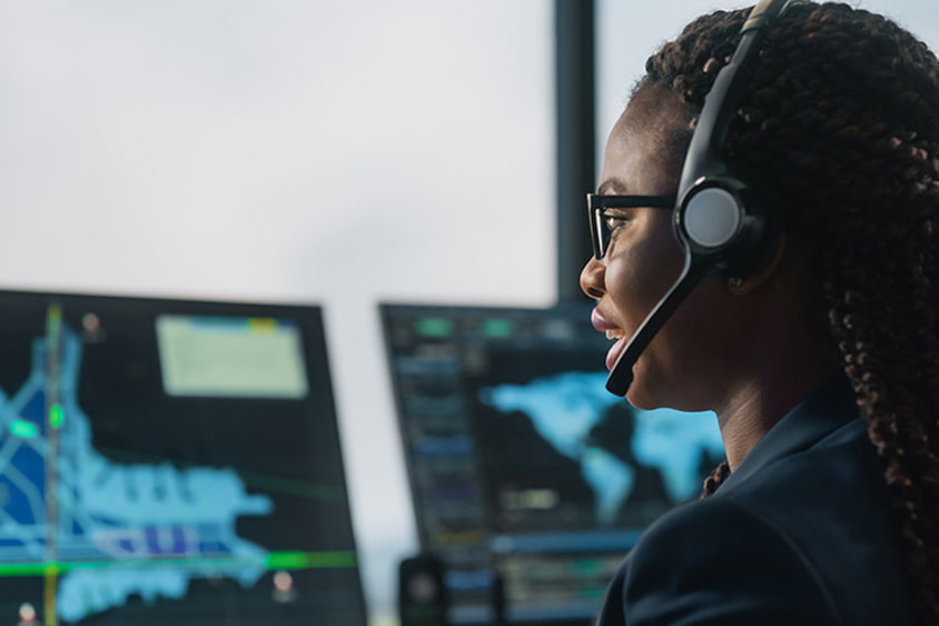 Air traffic control monitors aircrafts in flight.