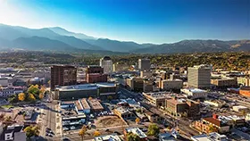 An aerial view of a city near Pikes Peak.