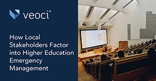 Students listening to a presentation in a lecture hall.