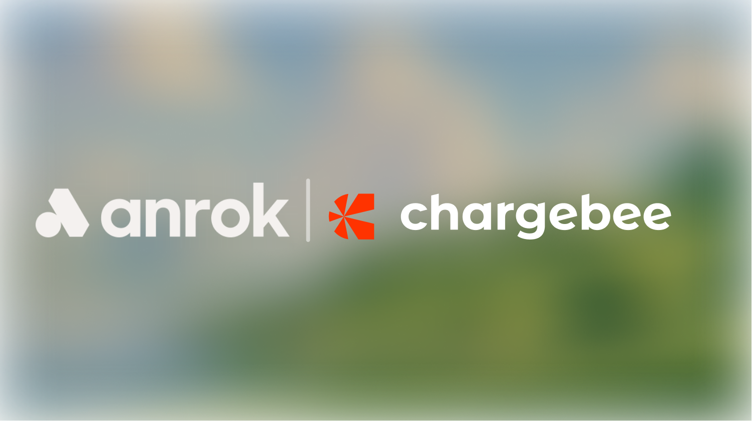 White anrok logo and text next to a red chargebee logo and text on a blurred background.