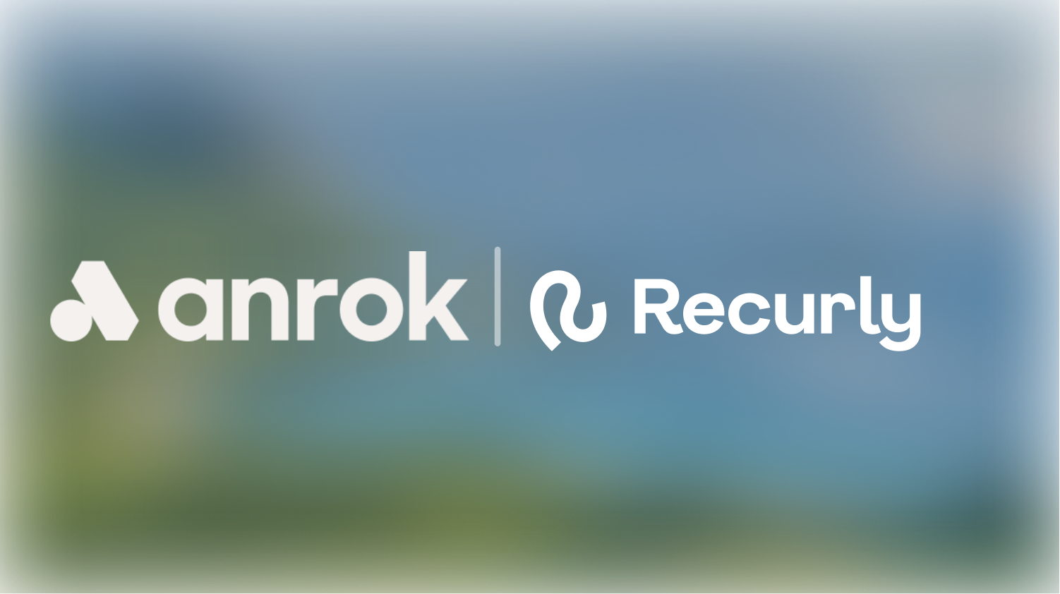 The logos of anrok and Recurly displayed side by side with a blurred outdoor background.