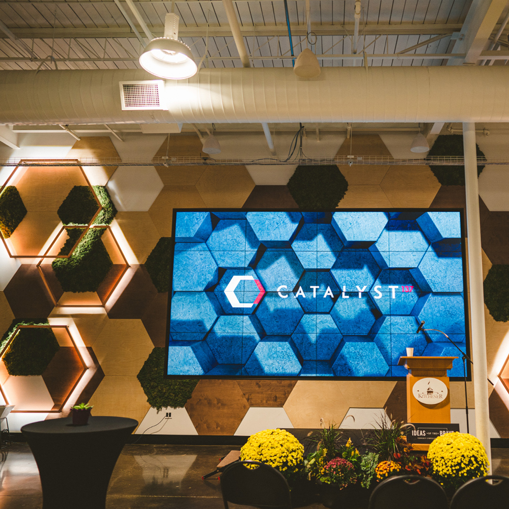 The video wall Tekena installed in the Catalyst 137 town hall space, displaying the building identity