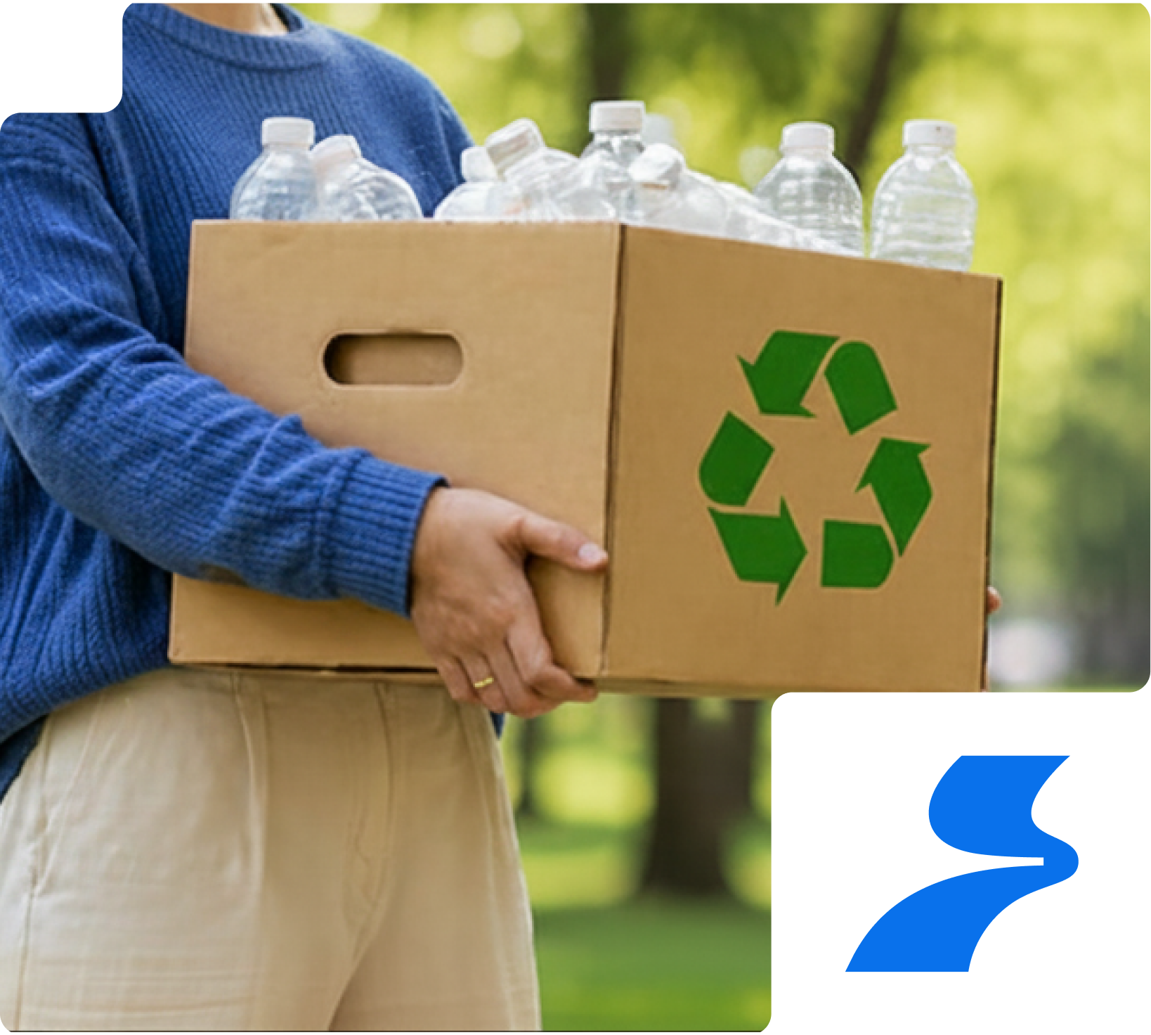 Person carrying a recycling box filled with plastic bottles