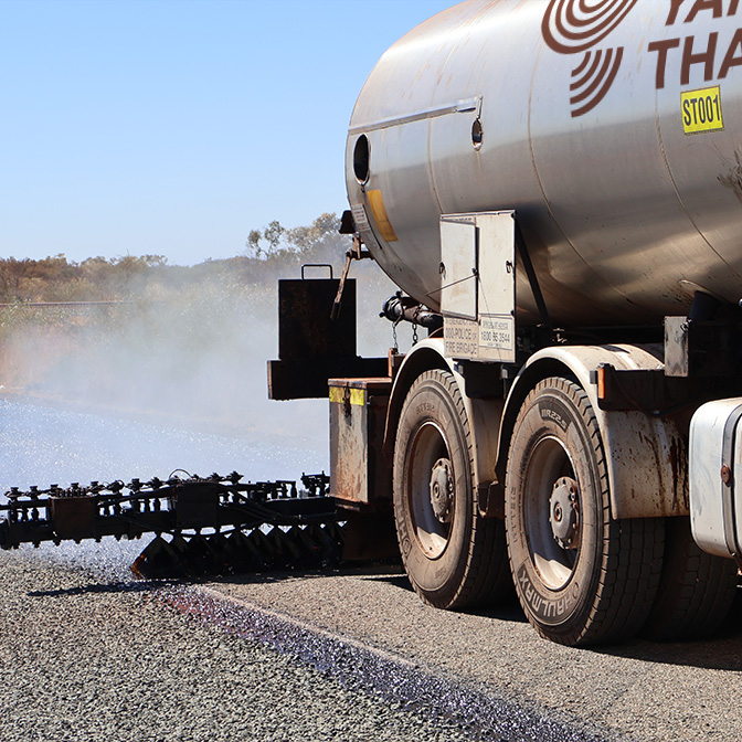 Yarnangu Tharla bitumen spray tanker sealing a regional WA road