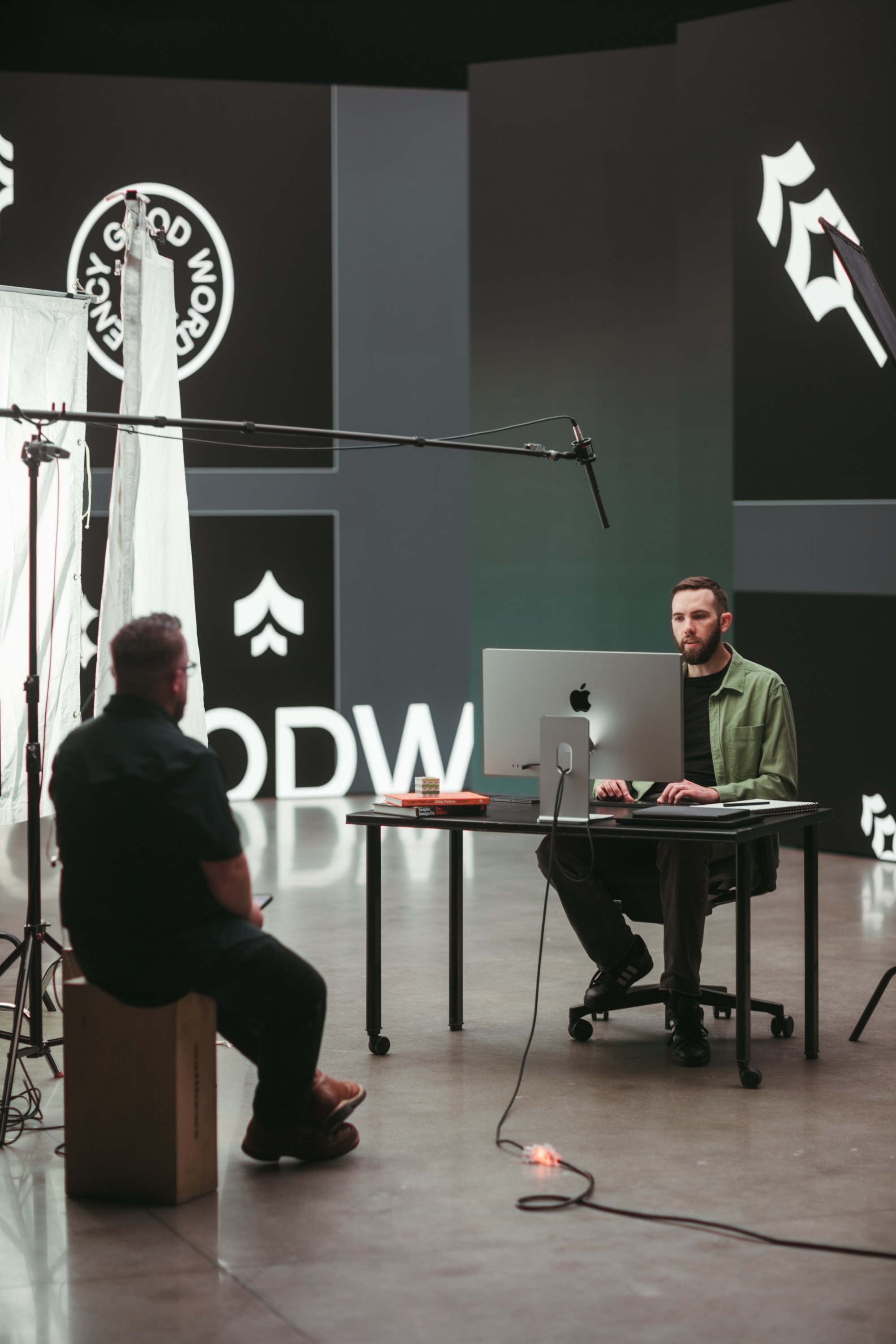 Crew member watching an interview set in the Good Word studio