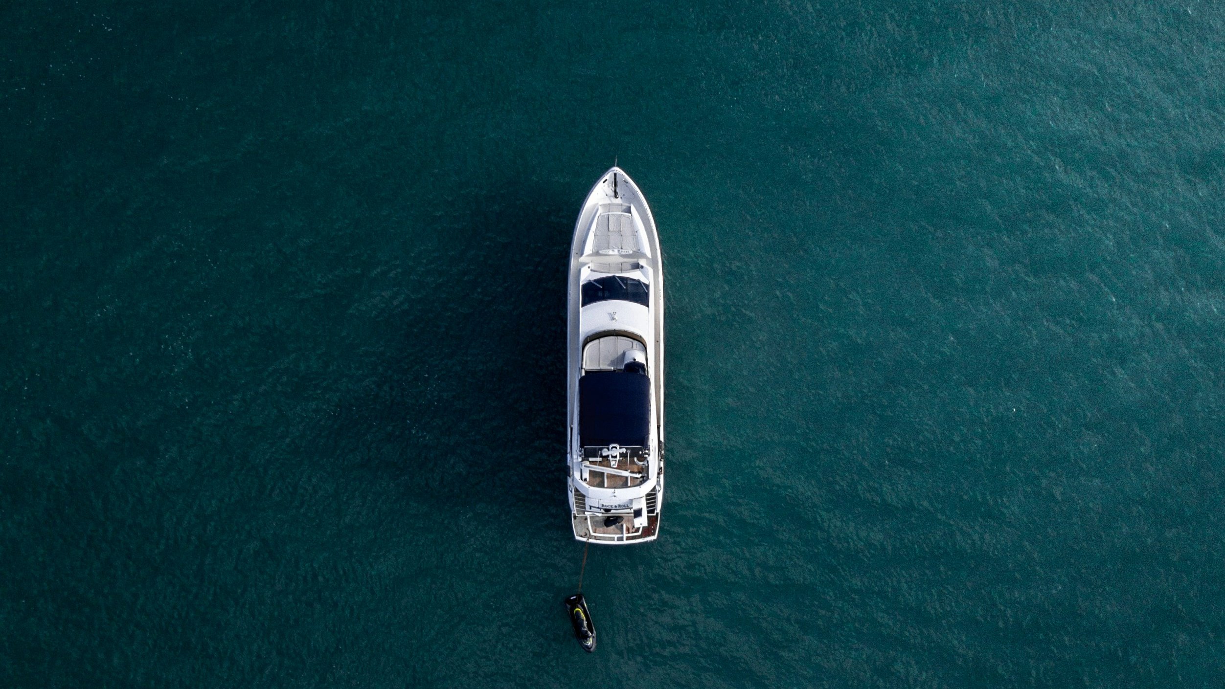 Aerial photograph of a yacht on open water