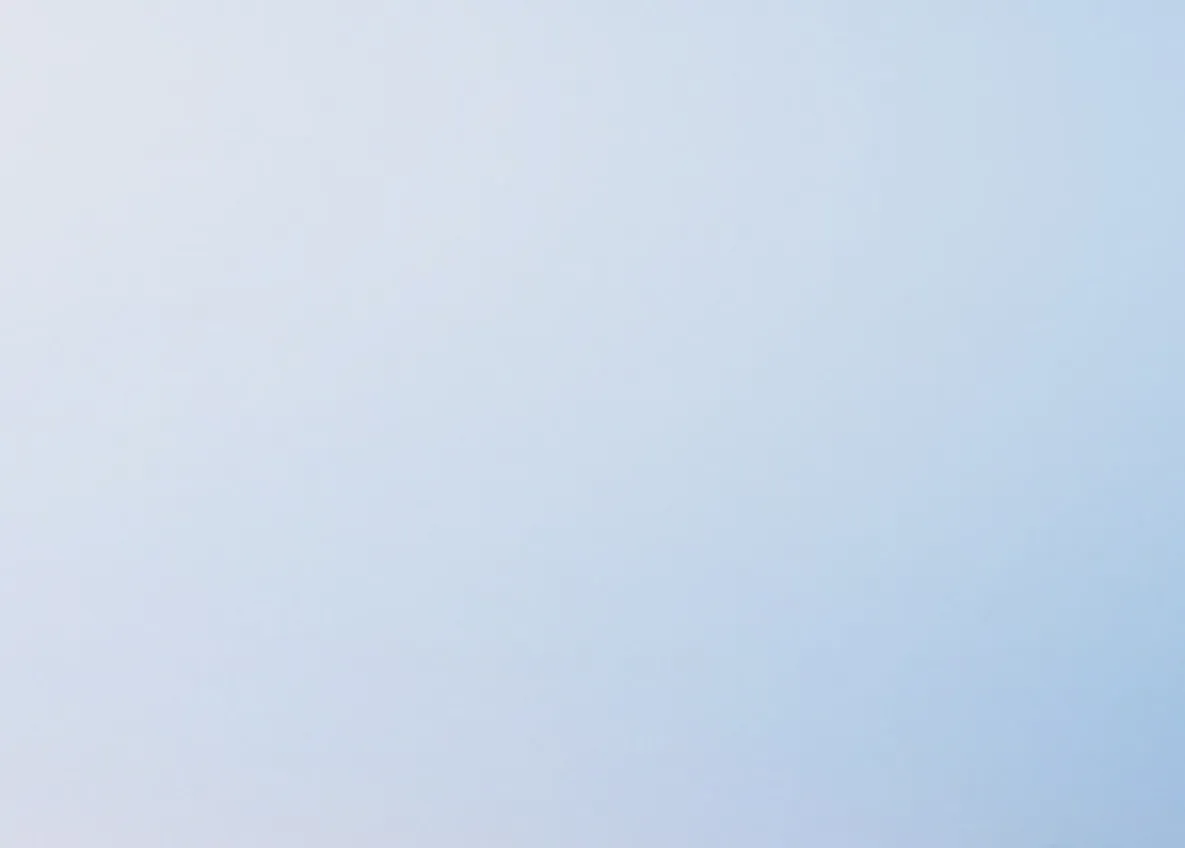 Soft pale blue gradient background.