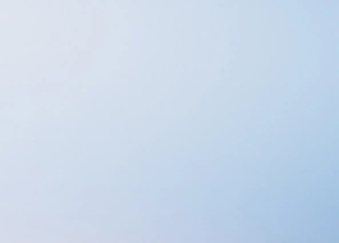 Soft light gray-to-blue gradient background with no text.