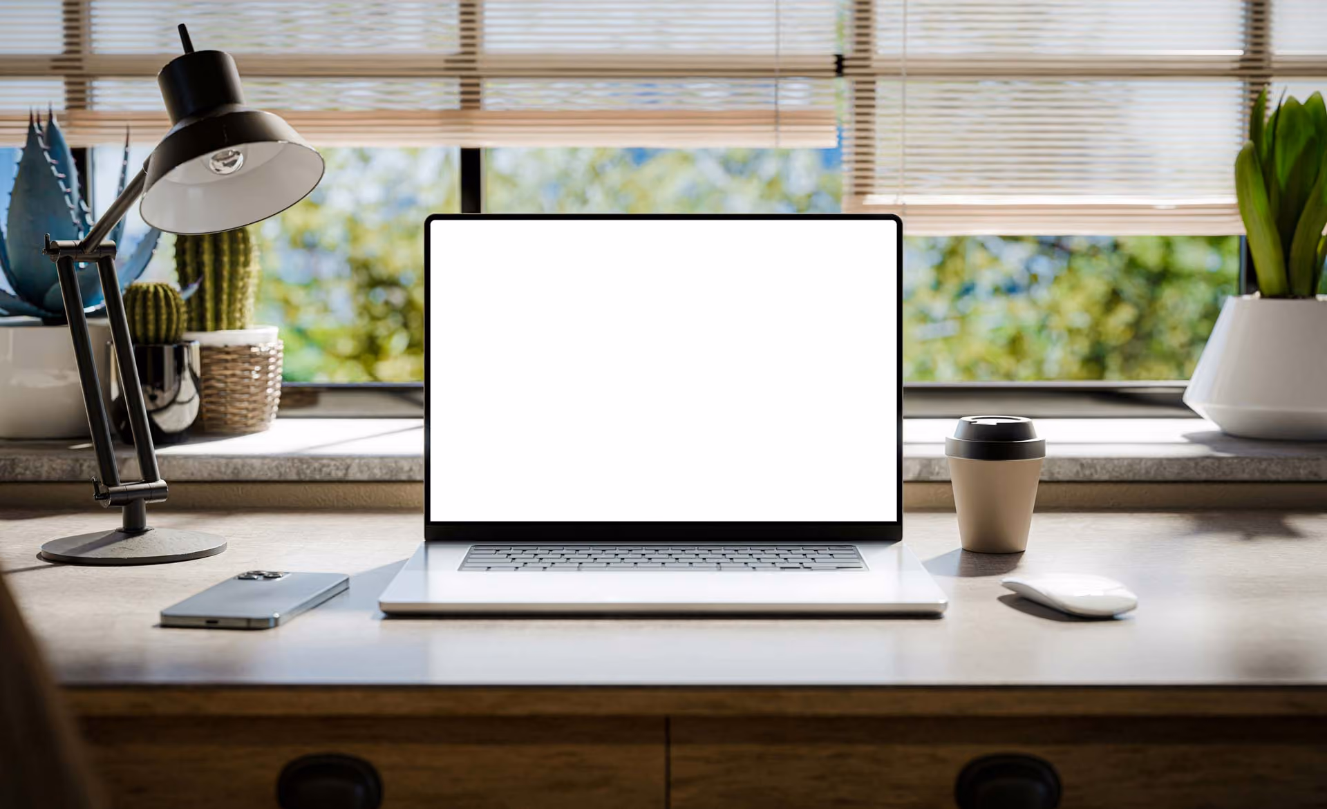 A MacBook on a table.