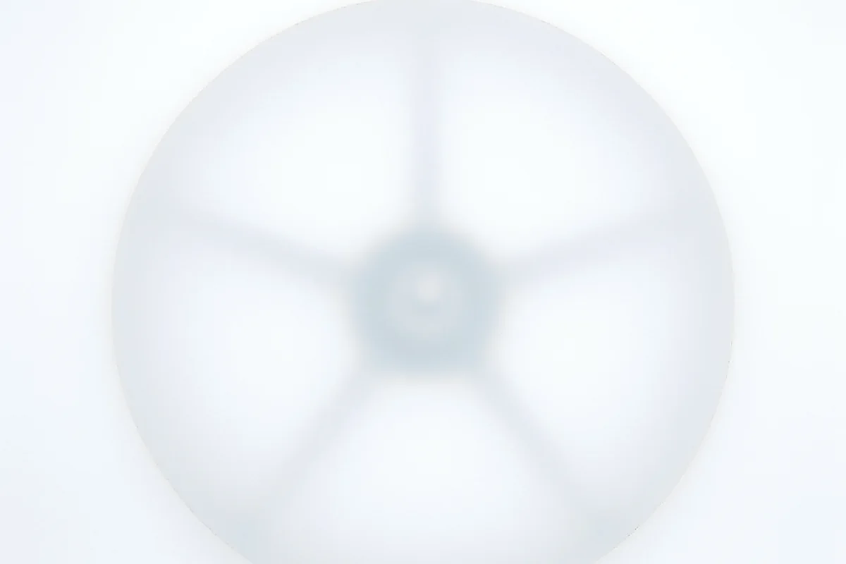 Translucent wheel behind frosted glass