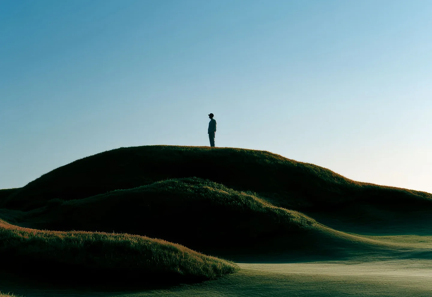 Figure in an open field