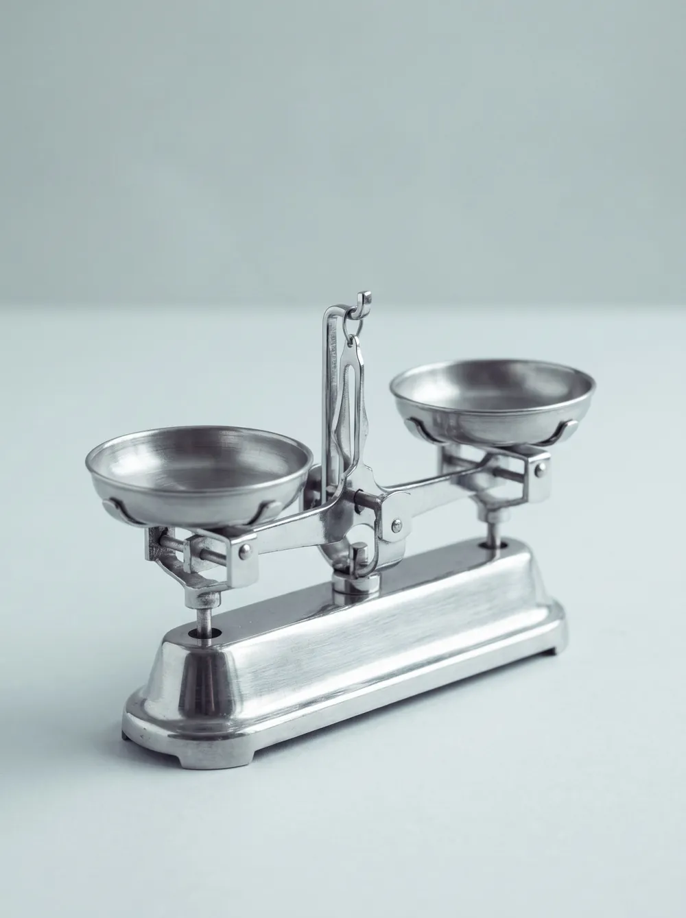 A chrome balance scale with two level pans