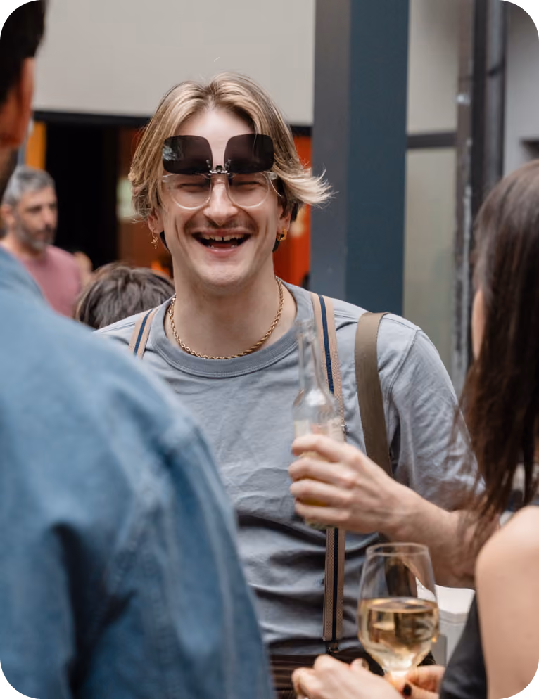 Funny picture of an Almedia Employee at a party with 2 pairs of glasses