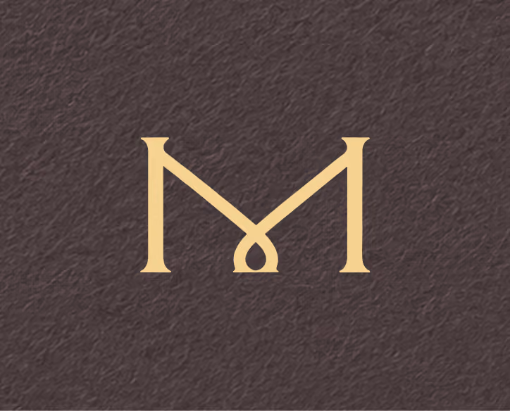 Stylized gold letter M with a curved loop connecting the middle on a dark textured background.