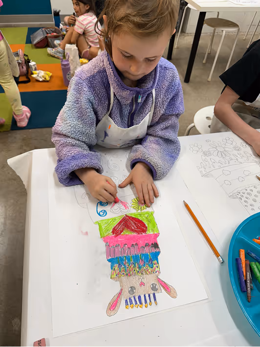 A child painting at Kidcreate workshop