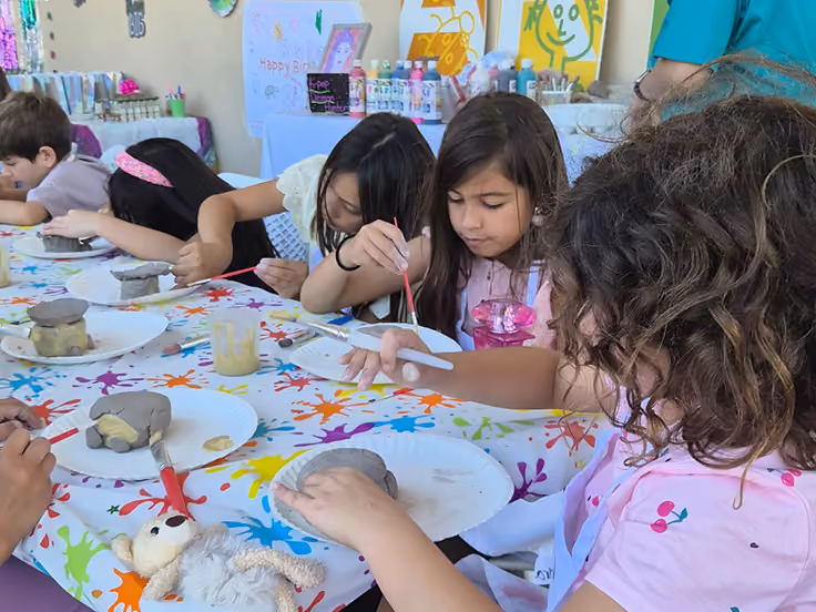 Clay party table mid-creation at Kidcreate
