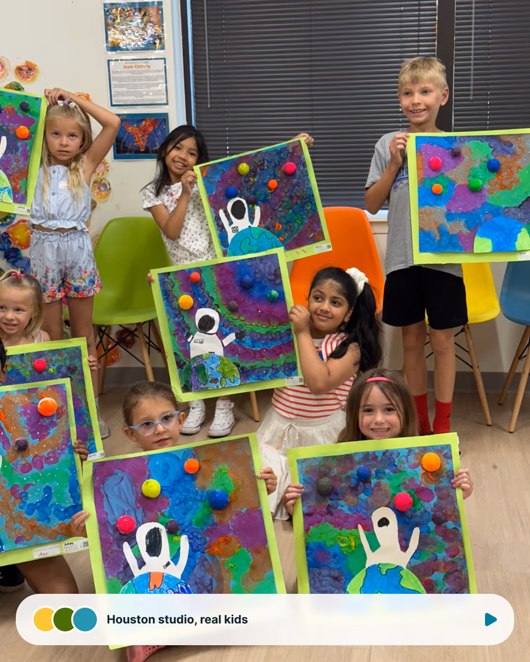 A joyful child celebrating at Kidcreate Studio Aliso Viejo