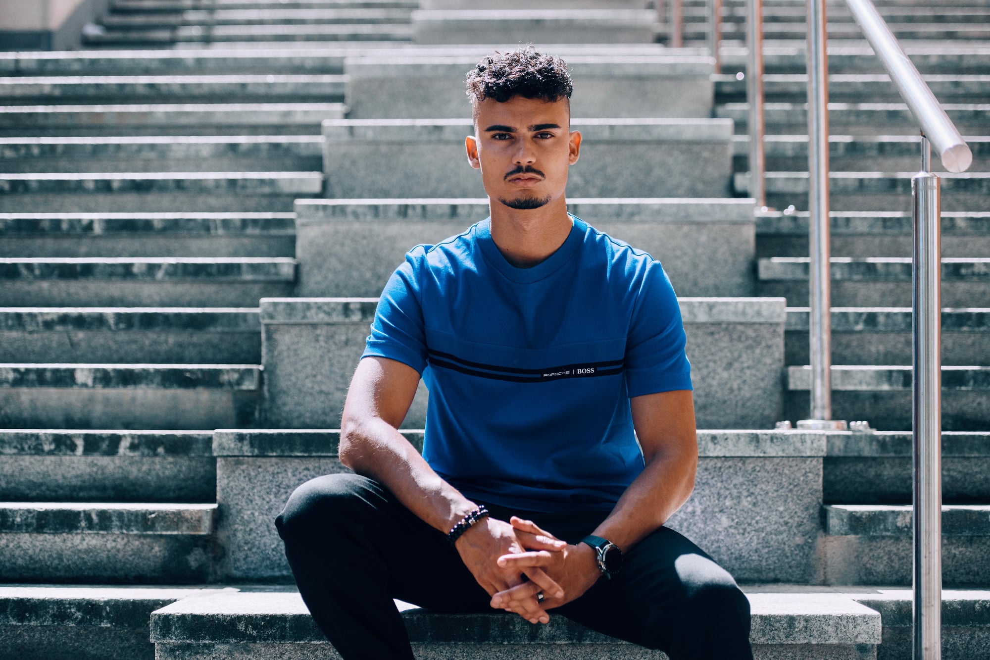 Pascal Wehrlein wearing the BOSS x Porsche collection during the Formula E activation in London