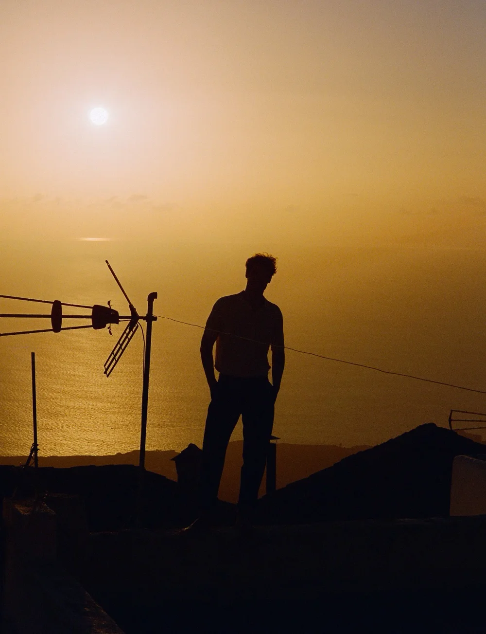 Analog menswear editorial in Mallorca, photographed by Felix Bernason — frame 11.