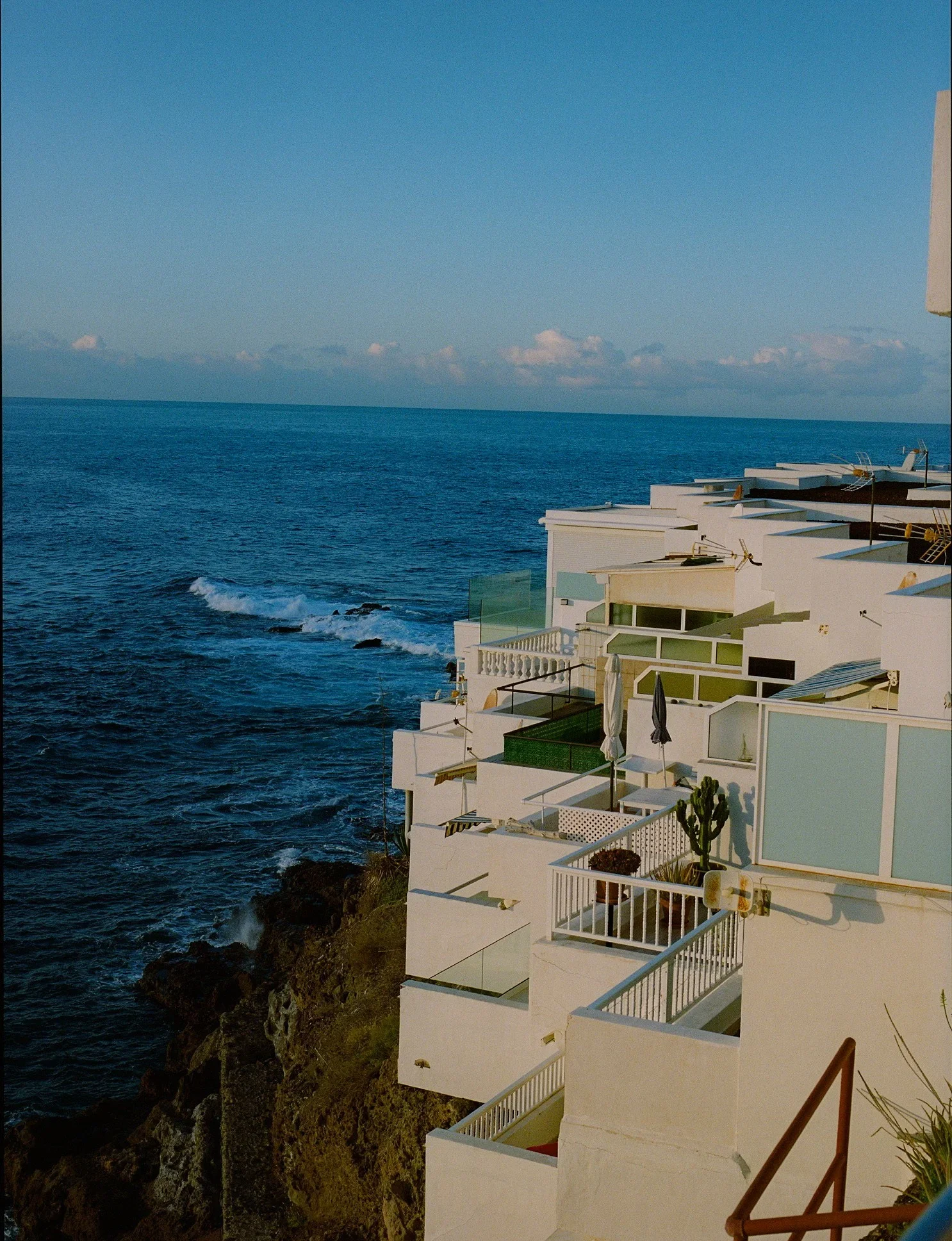 Analog menswear editorial in Mallorca, photographed by Felix Bernason — frame 10.