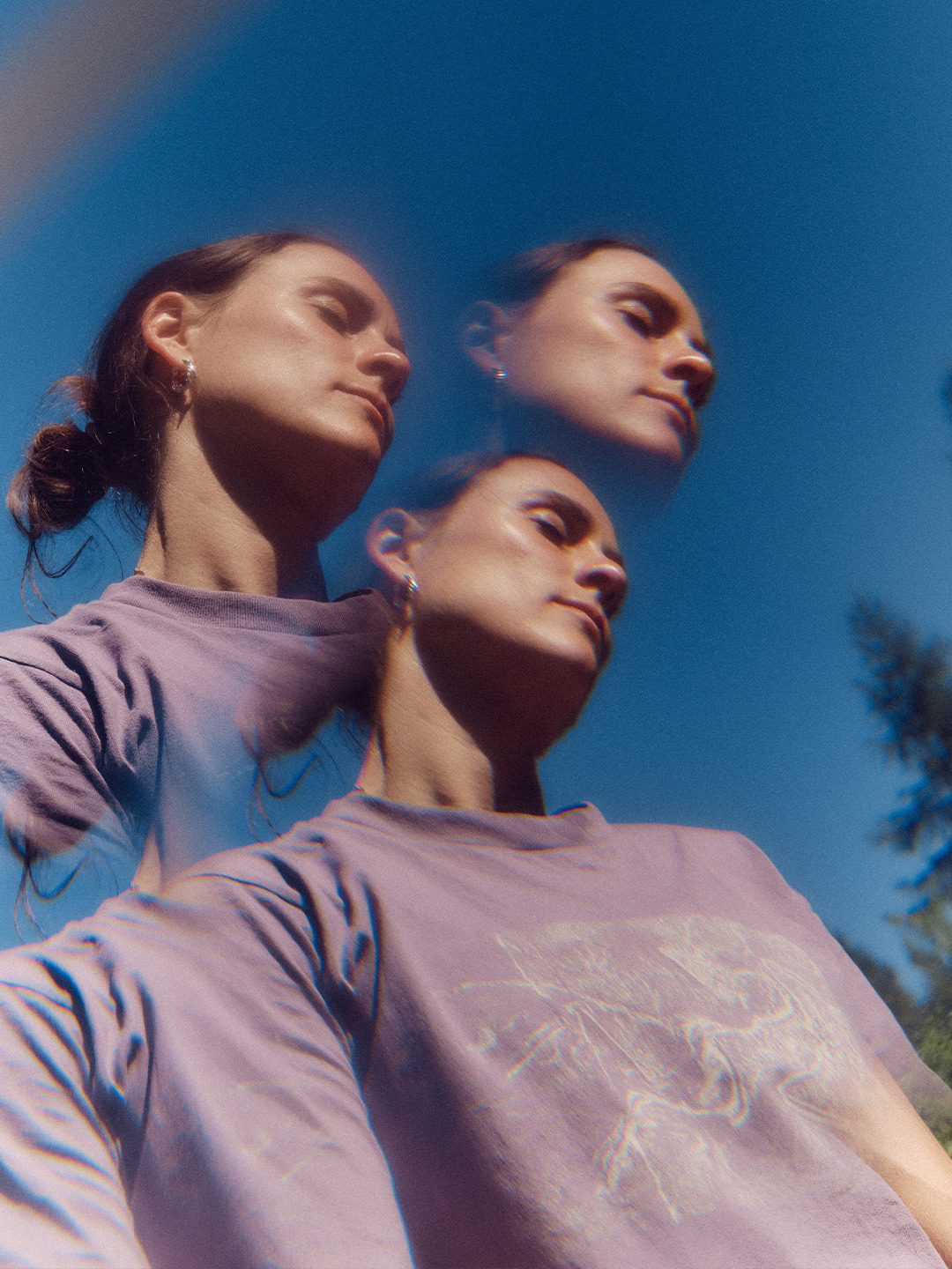 Arc'teryx Translating Flow State: Multiple-exposure portrait of a climber beneath blue sky.