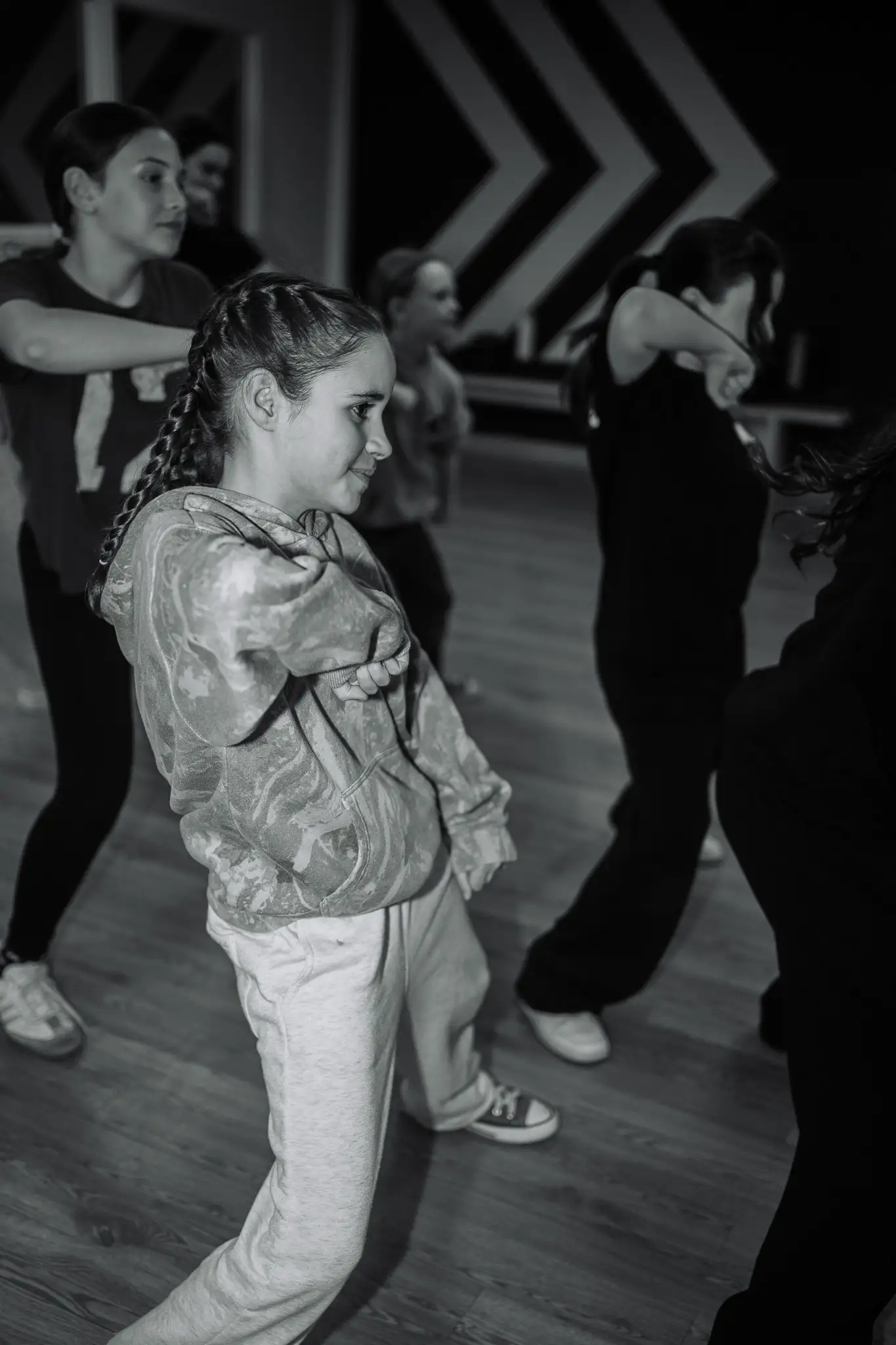 Membre d'une troupe compétitive en plein mouvement à l'École de Danse M3