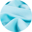 Close-up of soft, light blue fabric with smooth folds and texture.